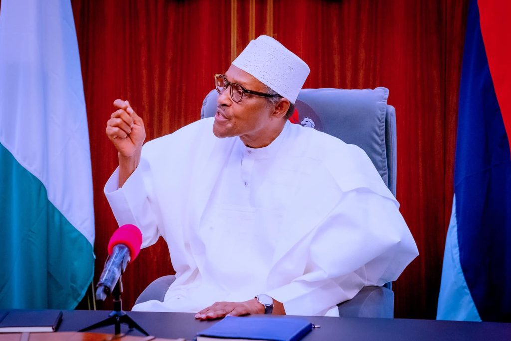 PRESIDENT BUHARI GREETS GM/CEO OF NATIONAL THEATRE, PROF. SUNDAY ENESSI ODODO AT 60